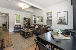 Firelite Cabin Interior firelite cabin interior with couch, coffee table, and dining table