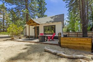 Firelite Cabin - front view firelite cabin with adirondack chairs and firepit