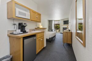 Room view at Firelite Lodge View of Hotel room with mini fridge, coffee maker, and microwave