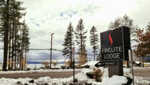 firelite lodge sign winter firelite lodge sign in winter with snow and trees