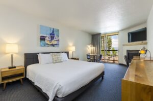 king room with lakeview king bed with lakeview balcony and fireplace